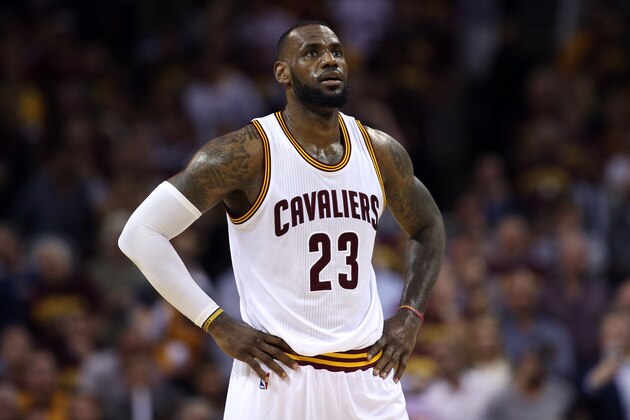 CLEVELAND, OH - JUNE 16:  LeBron James #23 of the Cleveland Cavaliers reacts against the Golden State Warriors during Game Six of the 2015 NBA Finals at Quicken Loans Arena on June 16, 2015 in Cleveland, Ohio. NOTE TO USER: User expressly acknowledges and agrees that, by downloading and or using this photograph, user is consenting to the terms and conditions of Getty Images License Agreement.  (Photo by Ezra Shaw/Getty Images)