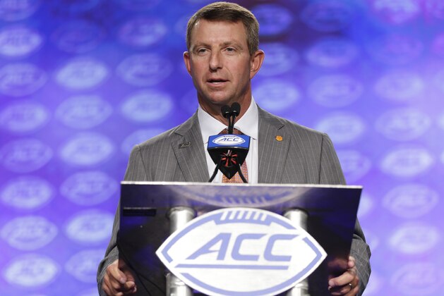 Clemson head coach Dabo Swinney speaks to the media during the Atlantic Coast Conference NCAA college football media day in Charlotte, N.C., Thursday, July 13, 2017. (AP Photo/Chuck Burton)