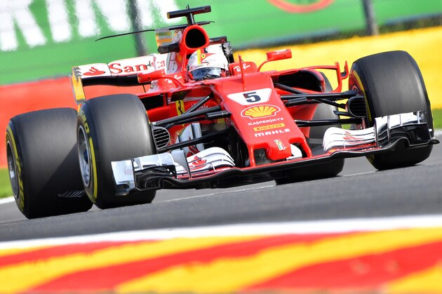 Ferrari's German driver Sebastian Vettel drives during the first practice session at the Spa-Francorchamps circuit in Spa on August 25, 2017 ahead of the Belgian Formula One Grand Prix. / AFP PHOTO / LOIC VENANCE        (Photo credit should read LOIC VENANCE/AFP/Getty Images)