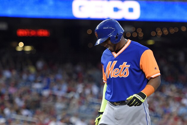 New York Mets' Yoenis Cespedes reacts during the first inning of a baseball game against the Washington Nationals, Friday, Aug. 25, 2017, in Washington. Cespedes left the game with an injury. (AP Photo/Nick Wass) New York Mets' Yoenis Cespedes reacts during the first inning of a baseball game against the Washington Nationals, Friday, Aug. 25, 2017, in Washington. Cespedes left the game with an injury. (AP Photo/Nick Wass)