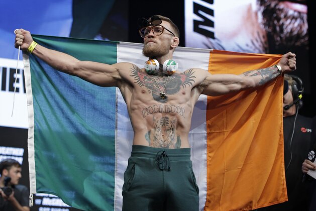 Conor McGregor stands on stage during a weigh-in Friday, Aug. 25, 2017, in Las Vegas. McGregor is scheduled to fight Floyd Mayweather Jr. in a boxing bout Saturday. (AP Photo/John Locher) Conor McGregor stands on stage during a weigh-in Friday, Aug. 25, 2017, in Las Vegas. McGregor is scheduled to fight Floyd Mayweather Jr. in a boxing bout Saturday. (AP Photo/John Locher)
