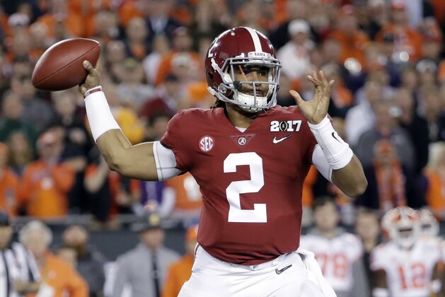 Alabama's Jalen Hurts throws during the first half of the NCAA college football playoff championship game against Clemson Monday, Jan. 9, 2017, in Tampa, Fla. (AP Photo/David J. Phillip)