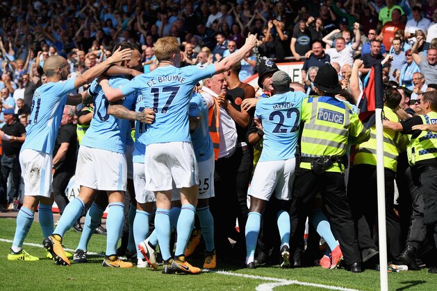 BOURNEMOUTH, ENGLAND - AUGUST 26:  Raheem Sterling of Manchester City celebrates scoring his sides second goal with his Manchester City team mates during the Premier League match between AFC Bournemouth and Manchester City at Vitality Stadium on August 26, 2017 in Bournemouth, England.  (Photo by Mike Hewitt/Getty Images)