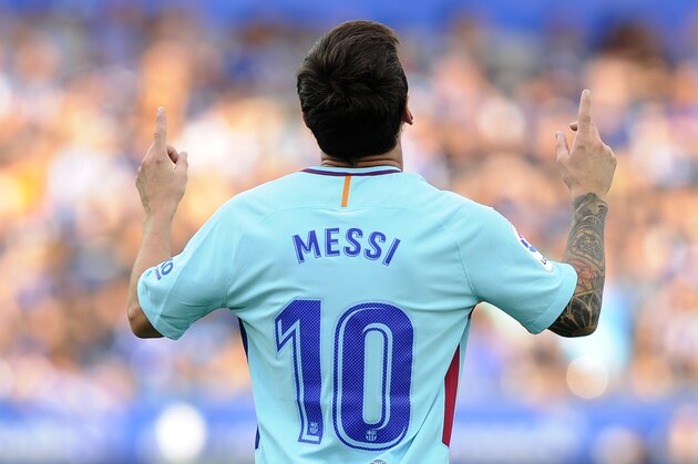 Barcelona's Argentinian forward Lionel Messi celebrates after scoring during the Spanish league football match Deportivo Alaves vs FC Barcelona at the Mendizorroza stadium in Vitoria on August 26, 2017. / AFP PHOTO / ANDER GILLENEA        (Photo credit should read ANDER GILLENEA/AFP/Getty Images)