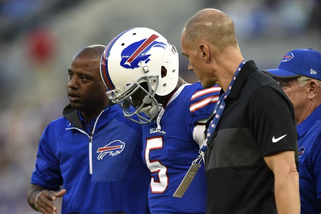 Buffalo Bills quarterback Tyrod Taylor (5) is assisted off the field after being sacked by Baltimore Ravens linebacker Matt Judon in the first half of a preseason NFL football game, Saturday, Aug. 26, 2017, in Baltimore. (AP Photo/Gail Burton)
