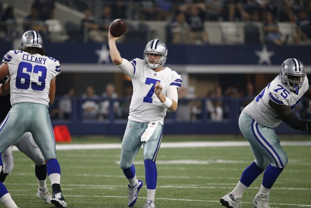 Dallas Cowboys' Emmett Cleary (63) and Byron Bell (75) provide protection as quarterback Cooper Rush throws a pass in the second half of a preseason NFL football game against the Oakland Raiders on Saturday, Aug. 26, 2017, in Arlington, Texas. (AP Photo/Ron Jenkins)
