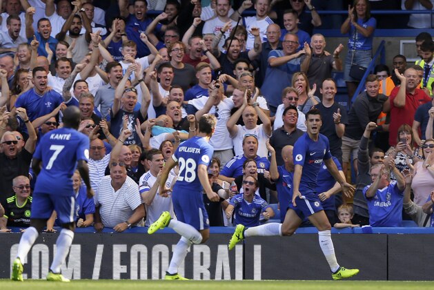 Chelsea's Alvaro Morata, right, celebrates after scoring his side's second goal during the English Premier League soccer match between Chelsea and Everton at Stamford Bridge stadium in London, Sunday, Aug. 27, 2017. (AP Photo/Alastair Grant)