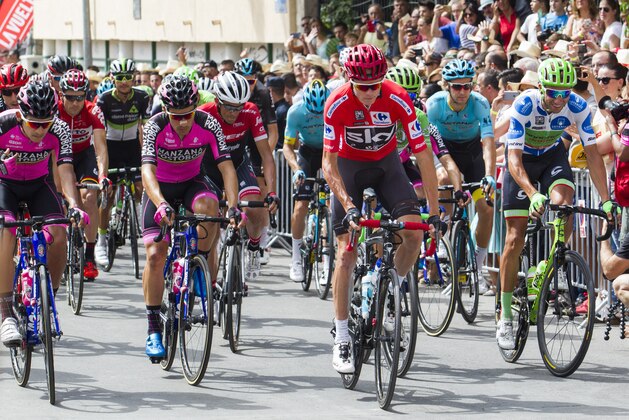 Sky's British cyclist Chris Froome rides in the pack during the 8th stage of the 72nd edition of 'La Vuelta' Tour of Spain cycling race, a 199,5km route between Hellin to Xorret de Cati, in Hellin on August 26, 2017. / AFP PHOTO / JAIME REINA        (Photo credit should read JAIME REINA/AFP/Getty Images)