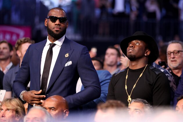 LAS VEGAS, NV - AUGUST 26: (L-R) NBA player Lebron James and producer Sean Combs attend the super welterweight boxing match between Floyd Mayweather Jr. and Conor McGregor on August 26, 2017 at T-Mobile Arena in Las Vegas, Nevada. (Photo by Christian Petersen/Getty Images) LAS VEGAS, NV - AUGUST 26: (L-R) NBA player Lebron James and producer Sean Combs attend the super welterweight boxing match between Floyd Mayweather Jr. and Conor McGregor on August 26, 2017 at T-Mobile Arena in Las Vegas, Nevada. (Photo by Christian Petersen/Getty Images)