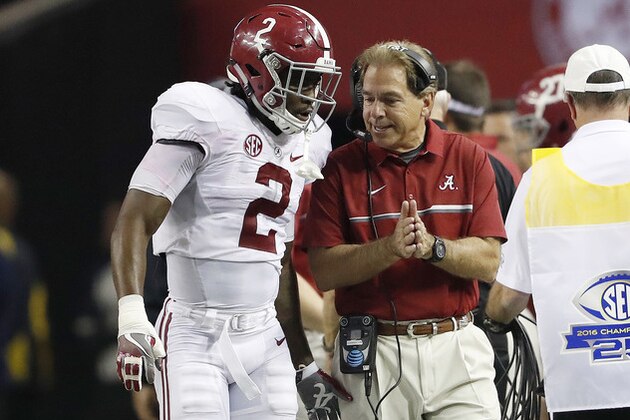 Alabama quarterback Jalen Hurts (2) speaks with Alabama head coach Nick Saban during the second half of the Southeastern Conference championship NCAA college football game between Alabama and Florida, Saturday, Dec. 3, 2016, in Atlanta.(AP Photo/John Bazemore)