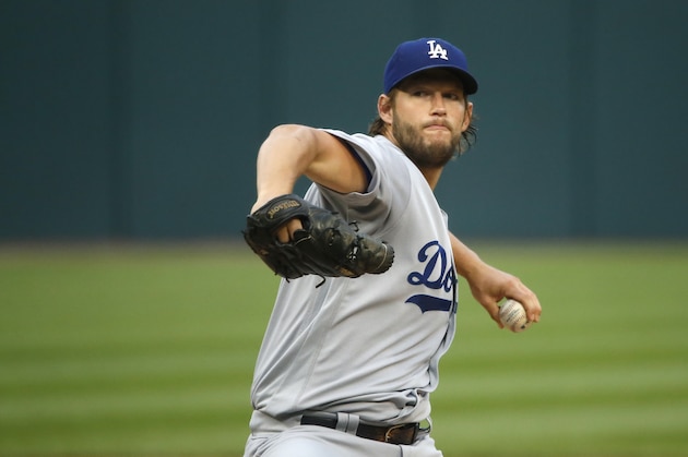 Los Angeles Dodgers starting pitcher Clayton Kershaw winds up during the first inning of the team's baseball game against the Chicago White Sox on Tuesday, July 18, 2017, in Chicago. (AP Photo/Charles Rex Arbogast)