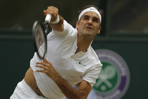 File-This July 16, 2017, file photo shows Switzerland's Roger Federer serving to Croatia's Marin Cilic in the Men's Singles final match at the Wimbledon Tennis Championships in London. (AP Photo/Alastair Grant, File)