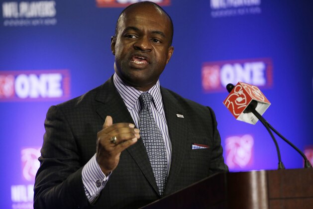 FILE - In this Jan., 2015, file photo, NFL Players Association Executive Director DeMaurice Smith speaks during a news conference for the NFL Super Bowl XLIX football game in Phoenix. Smith retained his position as executive director of the NFL players' union in voting Sunday by 32 player representatives. (AP Photo/David J. Phillip, File)