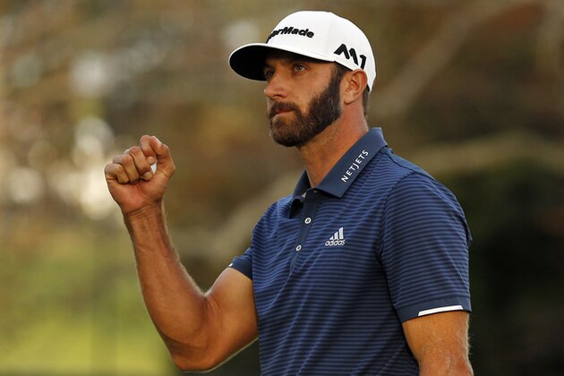 Dustin Johnson reacts after winning The Northern Trust golf tournament on a playoff hole over Jordan Spieth on Sunday, Aug. 27, 2017, in Old Westbury, N.Y. (AP Photo/Adam Hunger)