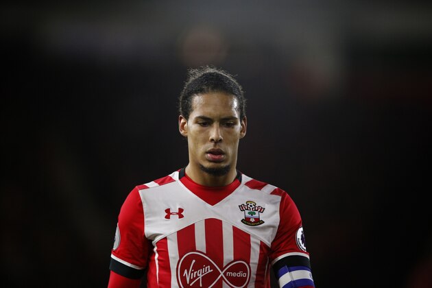Southampton's Dutch defender Virgil van Dijk reacts during the EFL (English Football League) Cup semi-final first-leg football match between Southampton and Liverpool at St Mary's Stadium in Southampton, southern England on January 11, 2017. / AFP / Adrian DENNIS / RESTRICTED TO EDITORIAL USE. No use with unauthorized audio, video, data, fixture lists, club/league logos or 'live' services. Online in-match use limited to 75 images, no video emulation. No use in betting, games or single club/league/player publications.  /         (Photo credit should read ADRIAN DENNIS/AFP/Getty Images)