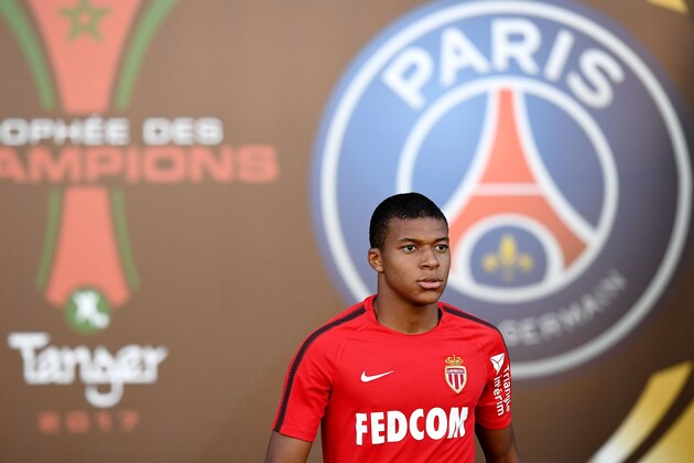 Monaco's French forward Kylian Mbappe arrives for a training session at the Grand Stade in Tangiers on July 28, 2017 on the eve of the French Trophy of Champions (Trophee des Champions) football match between Paris Saint-Germain and Monaco. / AFP PHOTO / FRANCK FIFE        (Photo credit should read FRANCK FIFE/AFP/Getty Images)