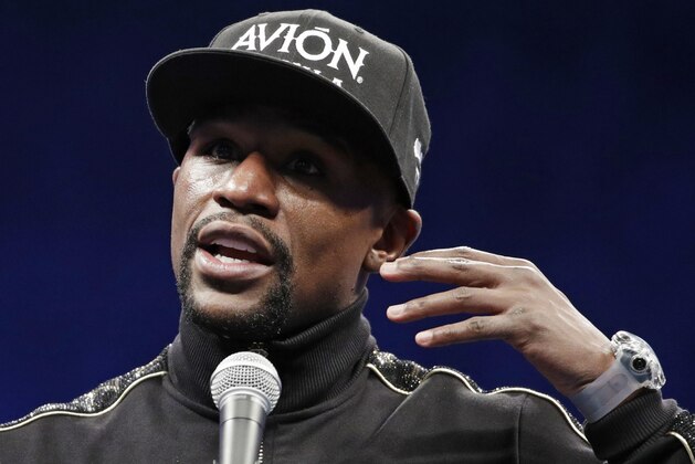 Floyd Mayweather Jr. speaks at a news conference after a super welterweight boxing match against Conor McGregor, Sunday, Aug. 27, 2017, in Las Vegas. (AP Photo/Isaac Brekken) Floyd Mayweather Jr. speaks at a news conference after a super welterweight boxing match against Conor McGregor, Sunday, Aug. 27, 2017, in Las Vegas. (AP Photo/Isaac Brekken)