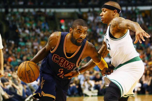 BOSTON, MA - MAY 19: Kyrie Irving #2 of the Cleveland Cavaliers drives to the basket against Isaiah Thomas #4 of the Boston Celtics in the second half during Game Two of the 2017 NBA Eastern Conference Finals at TD Garden on May 19, 2017 in Boston, Massachusetts. NOTE TO USER: User expressly acknowledges and agrees that, by downloading and or using this photograph, User is consenting to the terms and conditions of the Getty Images License Agreement.  (Photo by Adam Glanzman/Getty Images)