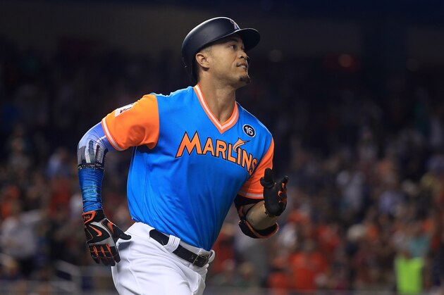 MIAMI, FL - AUGUST 25: Giancarlo Stanton #27 of the Miami Marlins hits a two run home run in the first inning during a game against the San Diego Padres at Marlins Park on August 25, 2017 in Miami, Florida. (Photo by Mike Ehrmann/Getty Images) MIAMI, FL - AUGUST 25: Giancarlo Stanton #27 of the Miami Marlins hits a two run home run in the first inning during a game against the San Diego Padres at Marlins Park on August 25, 2017 in Miami, Florida. (Photo by Mike Ehrmann/Getty Images)