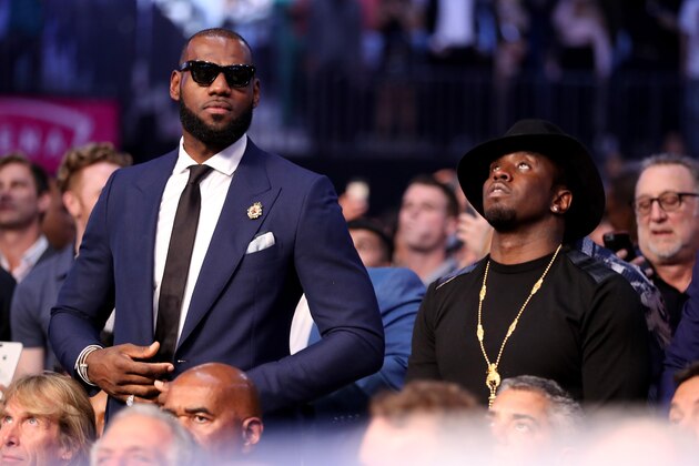 LAS VEGAS, NV - AUGUST 26:  (L-R) NBA player Lebron James and producer Sean Combs attend the super welterweight boxing match between Floyd Mayweather Jr. and Conor McGregor on August 26, 2017 at T-Mobile Arena in Las Vegas, Nevada.  (Photo by Christian Petersen/Getty Images)