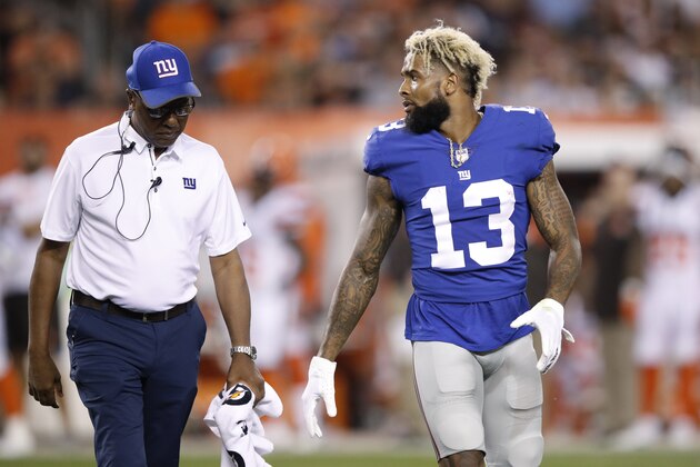 CLEVELAND, OH - AUGUST 21: Odell Beckham Jr. #13 of the New York Giants looks toward the defense as he walks off the field after suffering an injury during a preseason game against the Cleveland Browns at FirstEnergy Stadium on August 21, 2017 in Cleveland, Ohio. (Photo by Joe Robbins/Getty Images)