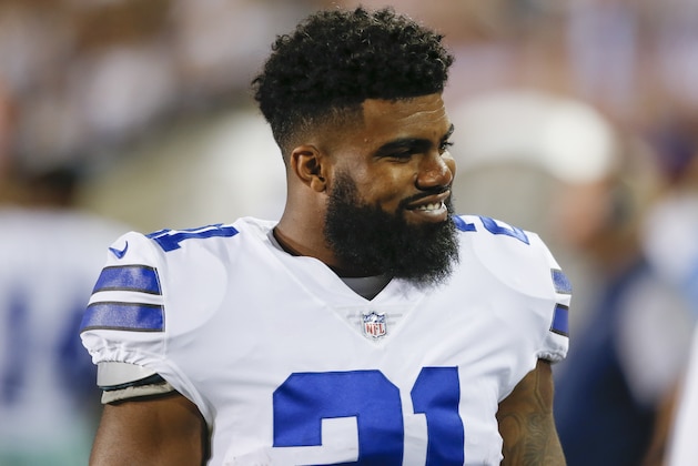 Dallas Cowboys running back Ezekiel Elliott (21) smiles on the sideling during the first half of the Pro Football Hall of Fame NFL preseason game against the Arizona Cardinals in Canton, Ohio, Thursday, Aug. 3, 2017. (AP Photo/Ron Schwane)