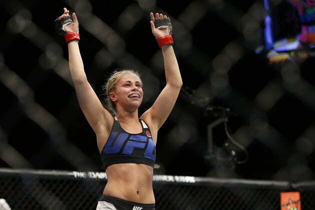 Paige VanZant celebrates after defeating Alex Chambers in their women’s straw weight mixed martial arts bout at UFC 191 on Saturday, Sept. 5, 2015, in Las Vegas. (AP Photo/John Locher) Paige VanZant celebrates after defeating Alex Chambers in their women’s straw weight mixed martial arts bout at UFC 191 on Saturday, Sept. 5, 2015, in Las Vegas. (AP Photo/John Locher)