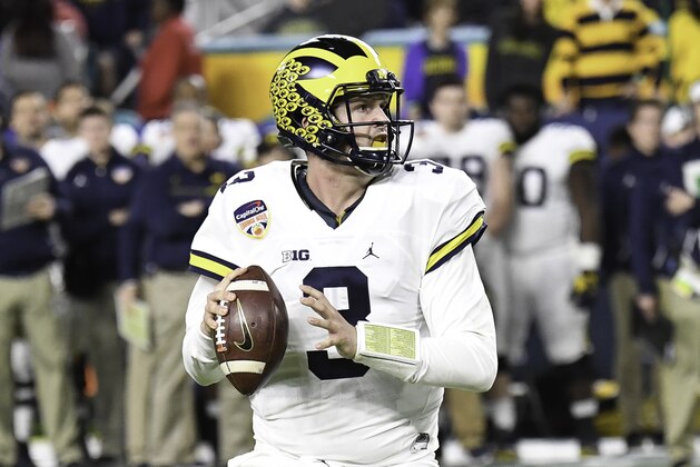 MIAMI GARDENS, FL - DECEMBER 30: Quarterback Wilton Speight #3 of the Michigan Wolverines looks for a receiver during the Capital One Orange Bowl against the Florida State Seminoles on December 30, 2016 at Hard Rock Stadium in Miami Gardens, FL. (Photo by Ron Elkman/Sports Imagery/Getty Images)