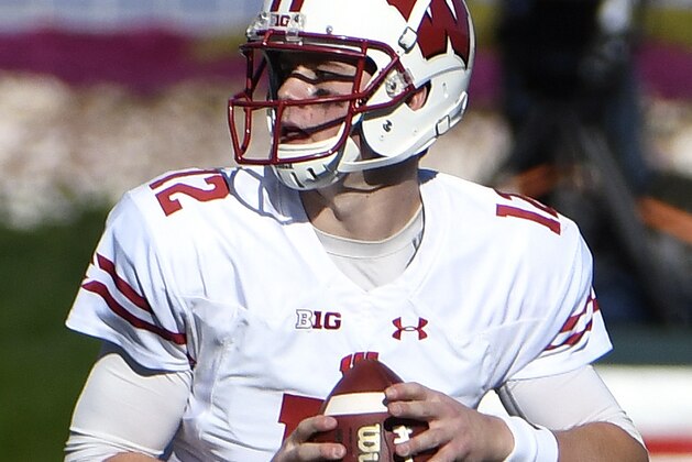 Wisconsin quarterback Alex Hornibrook (12) drops back to pass against Northwestern during the first half of an NCAA college football game in Evanston, Ill., Saturday, Nov. 5, 2016. (AP Photo/David Banks)