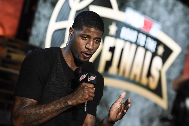 IMAGE DISTRIBUTED FOR NBA 2K - Paul George seen at the NBA 2K16 Road to the Finals championship event on Wednesday, June 1, 2016, in Los Angeles. Two teams of gamers go head to head during a competition that merges simulation basketball with eSports for a shot at $250,000 and a trip to the 2015-2016 NBA Finals. (Photo by Dan Steinberg/Invision for NBA 2K/AP Images)