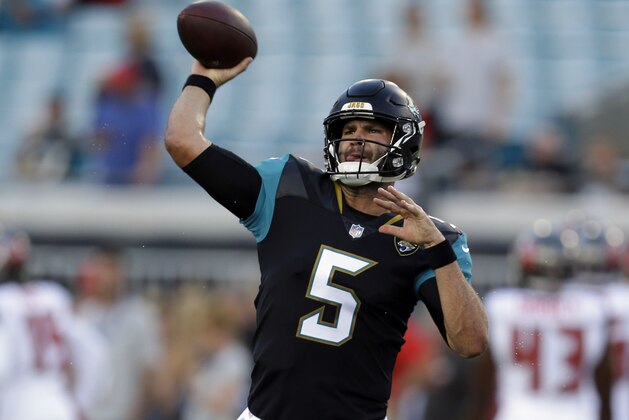 Jacksonville Jaguars quarterback Blake Bortles (5) warms up before an NFL preseason football game against the Tampa Bay Buccaneers, Thursday, Aug. 17, 2017, in Jacksonville, Fla. (AP Photo/John Raoux)
