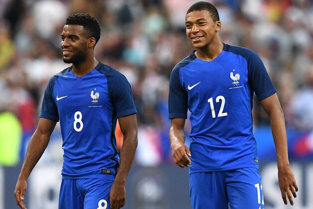 France's forward Thomas Lemar (L) and midfielder Kylian Mbappe react following their 3-2 win over England in their international friendly football match between France and England at The Stade de France Stadium in Saint-Denis near Paris on June 13, 2017. / AFP PHOTO / FRANCK FIFE (Photo credit should read FRANCK FIFE/AFP/Getty Images) France's forward Thomas Lemar (L) and midfielder Kylian Mbappe react following their 3-2 win over England in their international friendly football match between France and England at The Stade de France Stadium in Saint-Denis near Paris on June 13, 2017. / AFP PHOTO / FRANCK FIFE (Photo credit should read FRANCK FIFE/AFP/Getty Images)