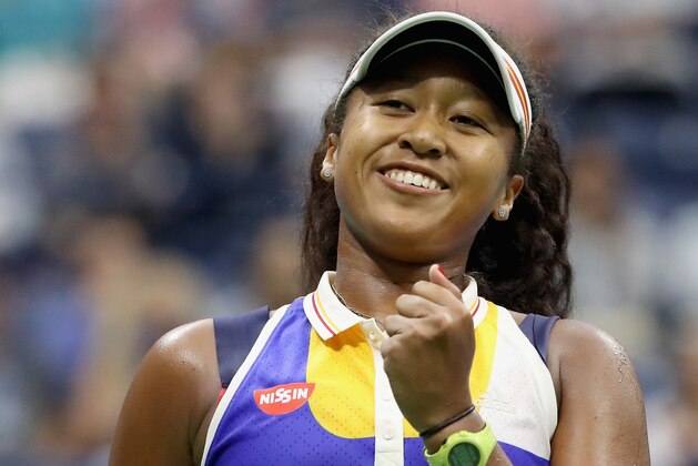 NEW YORK, NY - AUGUST 29:  Naomi Osaka of Japan celebrates defeating Angelique Kerber of Germany in their first round Women's Singles match on Day Two of the 2017 US Open at the USTA Billie Jean King National Tennis Center on August 29, 2017 in the Flushing neighborhood of the Queens borough of New York City.  (Photo by Abbie Parr/Getty Images)