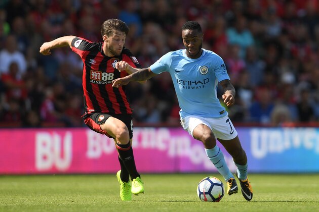 BOURNEMOUTH, ENGLAND - AUGUST 26:  Raheem Sterling of Manchester City battles with Harry Arter of Bournemouth during the Premier League match between AFC Bournemouth and Manchester City at Vitality Stadium on August 26, 2017 in Bournemouth, England.  (Photo by Mike Hewitt/Getty Images)