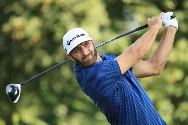 WESTBURY, NY - AUGUST 27:  Dustin Johnson of the United States plays his shot from the 13th tee during the final round of The Northern Trust at Glen Oaks Club on August 27, 2017 in Westbury, New York.  (Photo by Andrew Redington/Getty Images)