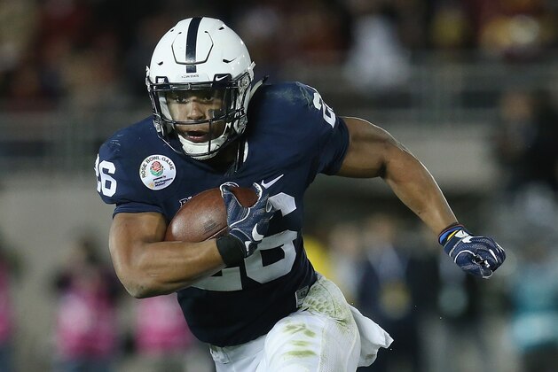 PASADENA, CA - JANUARY 02:  Running back Saquon Barkley #26 of the Penn State Nittany Lions runs with the ball against the USC Trojans during the 2017 Rose Bowl Game presented by Northwestern Mutual at the Rose Bowl on January 2, 2017 in Pasadena, California.  (Photo by Stephen Dunn/Getty Images)