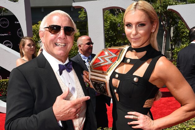 LOS ANGELES, CA - JULY 13:  WWE wrestler Ric Flair (L) and WWE Diva Charlotte attend the 2016 ESPYS at Microsoft Theater on July 13, 2016 in Los Angeles, California.  (Photo by Kevin Winter/Getty Images)