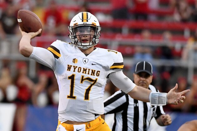 LAS VEGAS, NV - NOVEMBER 12:  Quarterback Josh Allen #17 of the Wyoming Cowboys throws against the UNLV Rebels during their game at Sam Boyd Stadium on November 12, 2016 in Las Vegas, Nevada. UNLV won 69-66 in triple overtime.  (Photo by Ethan Miller/Getty Images)