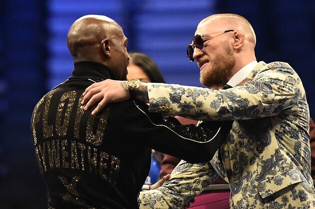 LAS VEGAS, NV - AUGUST 26: (L-R) Floyd Mayweather Jr. and Conor McGregor attend a news conference after Mayweather defeated Conor McGregor by 10th-round TKO in their super welterweight boxing match at T-Mobile Arena on August 26, 2017 in Las Vegas, Nevada. (Photo by Jeff Bottari/Zuffa LLC/Zuffa LLC via Getty Images) LAS VEGAS, NV - AUGUST 26: (L-R) Floyd Mayweather Jr. and Conor McGregor attend a news conference after Mayweather defeated Conor McGregor by 10th-round TKO in their super welterweight boxing match at T-Mobile Arena on August 26, 2017 in Las Vegas, Nevada. (Photo by Jeff Bottari/Zuffa LLC/Zuffa LLC via Getty Images)