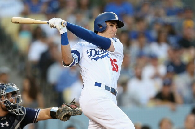 LOS ANGELES, CA - AUGUST 12:  Cody Bellinger #35 of the Los Angeles Dodgers hits a single in the third inning against the San Diego Padres at Dodger Stadium on August 12, 2017 in Los Angeles, California.  (Photo by Stephen Dunn/Getty Images)