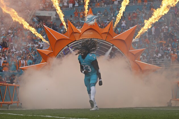 MIAMI GARDENS, FL - JANUARY 1: Jay Ajayi #23 of the Miami Dolphins is introduced prior to the start of the game against the New England Patriots on January 1, 2017 at Hard Rock Stadium in Miami Gardens, Florida. The Patriots defeated the Dolphins 35-14. (Photo by Joel Auerbach/Getty Images)
