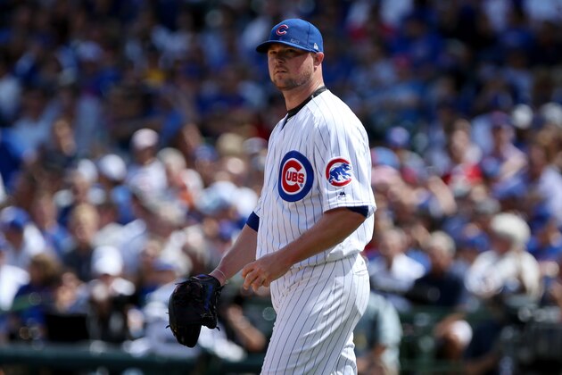 CHICAGO, IL - AUGUST 17:  Jon Lester #34 of the Chicago Cubs reacts after giving up a walk in the second inning against the Cincinnati Reds at Wrigley Field on August 17, 2017 in Chicago, Illinois. (Photo by Dylan Buell/Getty Images)