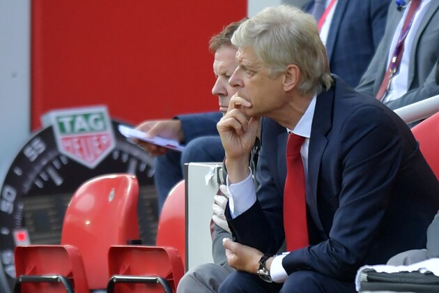 Arsenal's French manager Arsene Wenger looks on during the English Premier League football match between Liverpool and Arsenal at Anfield in Liverpool, north west England on August 27, 2017.
Liverpool won the game 4-0. / AFP PHOTO / Anthony Devlin / RESTRICTED TO EDITORIAL USE. No use with unauthorized audio, video, data, fixture lists, club/league logos or 'live' services. Online in-match use limited to 75 images, no video emulation. No use in betting, games or single club/league/player publications.  /         (Photo credit should read ANTHONY DEVLIN/AFP/Getty Images)
