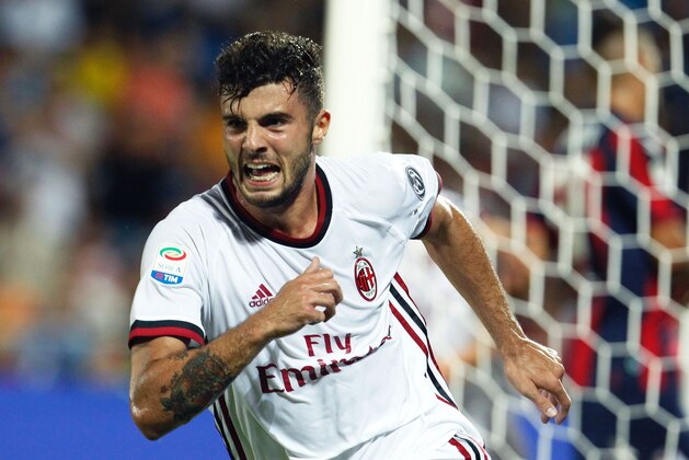 Milan's Italian forward Patrick Cutrone celebrates after scoring during the Italian Serie A football match FC Crotone vs AC Milan on August 20 2017 at the Ezio Scida Stadium. / AFP PHOTO / CARLO HERMANN        (Photo credit should read CARLO HERMANN/AFP/Getty Images)