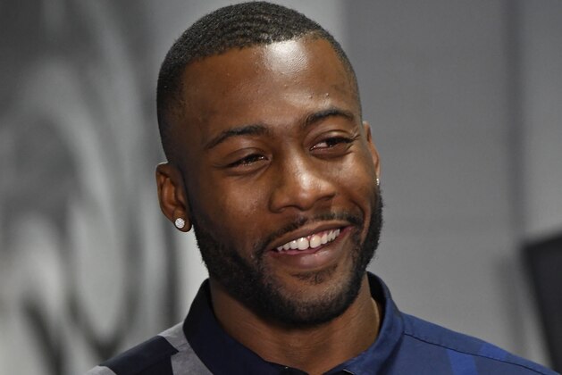 ORLANDO, FL - JULY 18:  Orlando Magic player Jonathon Simmons addresses the media on July 18, 2017 at Amway Center in Orlando, Florida. NOTE TO USER: User expressly acknowledges and agrees that, by downloading and or using this photograph, User is consenting to the terms and conditions of the Getty Images License Agreement. Mandatory Copyright Notice: Copyright 2017 NBAE  (Photo by Fernando Medina/NBAE via Getty Images)
