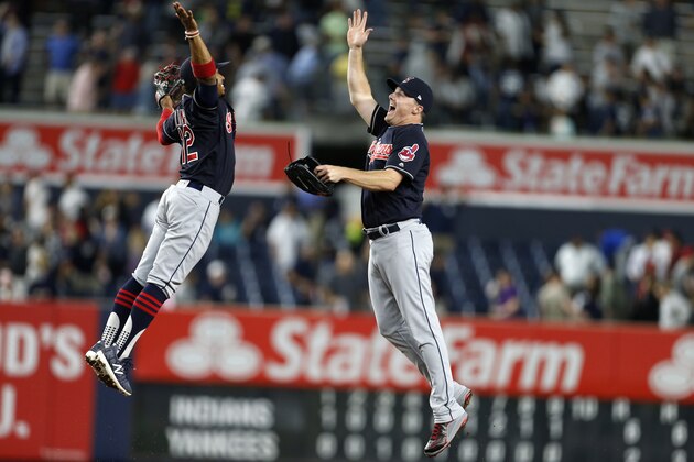 Aug 28, 2017; Bronx, NY, USA; Cleveland Indians right fielder Jay Bruce (32) celebrates with Indians shortstop Francisco Lindor (12) after defeating the New York Yankees at Yankee Stadium. Mandatory Credit: Adam Hunger-USA TODAY Sports