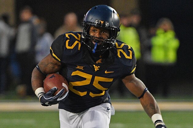 MORGANTOWN, WV - DECEMBER 03: Justin Crawford #25 of the West Virginia Mountaineers rushes in open field in the second quarter during the game against the Baylor Bears at Mountaineer Field on December 3, 2016 in Morgantown, West Virginia. (Photo by Justin Berl/Getty Images) MORGANTOWN, WV - DECEMBER 03: Justin Crawford #25 of the West Virginia Mountaineers rushes in open field in the second quarter during the game against the Baylor Bears at Mountaineer Field on December 3, 2016 in Morgantown, West Virginia. (Photo by Justin Berl/Getty Images)