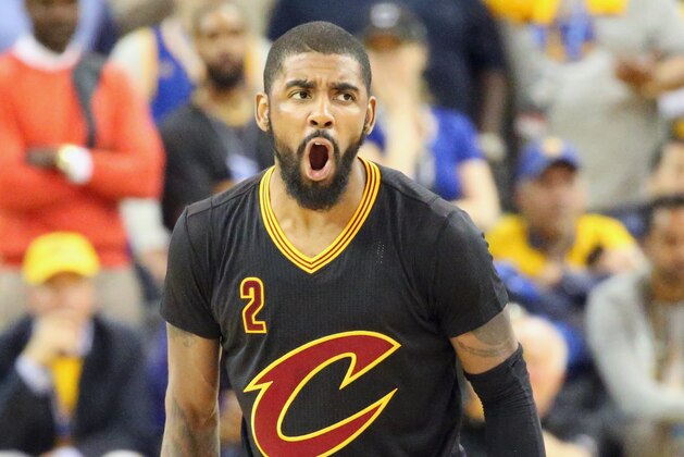 OAKLAND, CA - JUNE 12:  Kyrie Irving #2 of the Cleveland Cavaliers celebrates during the game against the Golden State Warriors in Game Five of the 2017 NBA Finals on June 12, 2017 at ORACLE Arena in Oakland, California. NOTE TO USER: User expressly acknowledges and agrees that, by downloading and or using this photograph, user is consenting to the terms and conditions of Getty Images License Agreement. Mandatory Copyright Notice: Copyright 2017 NBAE (Photo by Bruce Yeung/NBAE via Getty Images)