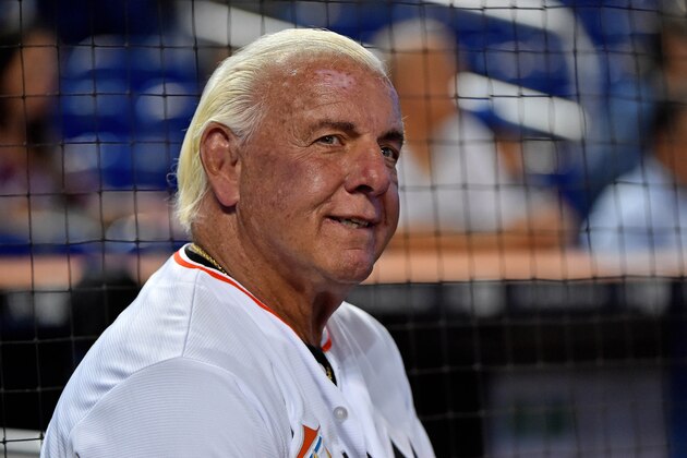 Jul 28, 2017; Miami, FL, USA; Former wrestling WCW and WWE wrestler Ric Flair warms up before throwing out the first pitch at Marlins Park prior to the game between the Cincinnati Reds and the Miami Marlins. Mandatory Credit: Jasen Vinlove-USA TODAY Sports