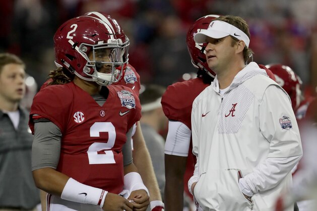 ATLANTA, GA - DECEMBER 31:  Jalen Hurts #2 of the Alabama Crimson Tide and Offensive Coordinator Lane Kiffin of the Alabama Crimson Tide talk during pre gamethe 2016 Chick-fil-A Peach Bowl at the Georgia Dome on December 31, 2016 in Atlanta, Georgia.  (Photo by Streeter Lecka/Getty Images)